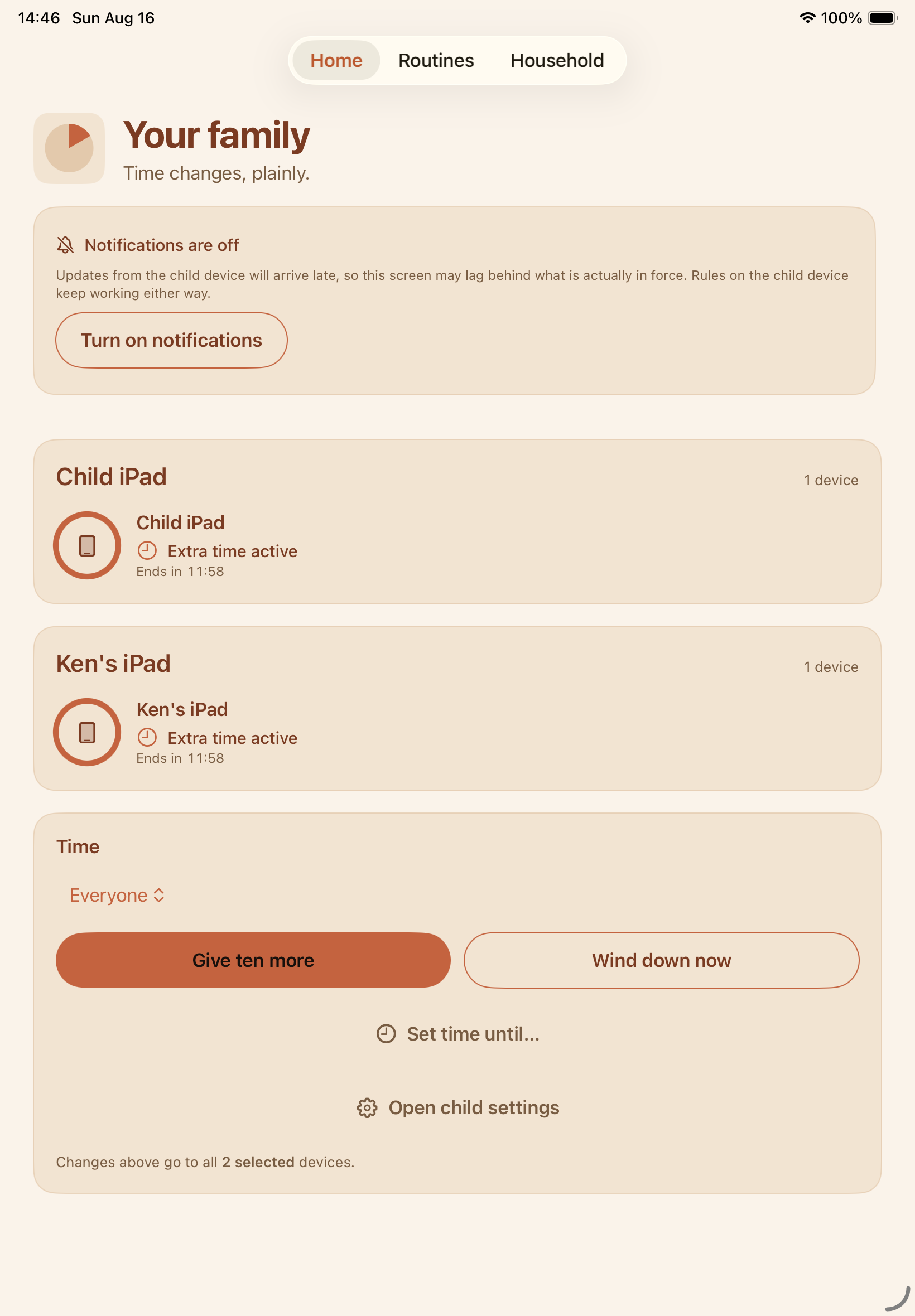 Actual TenMore parent home screen showing two child iPads, extra time active, and the Give ten more and Wind down now controls.
